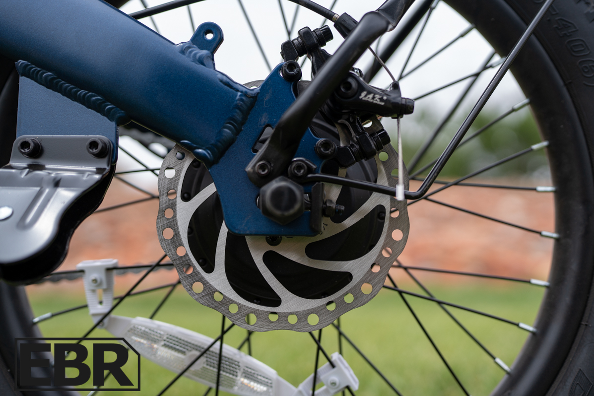 GoTrax E-Fold rear brake caliper close-up detail