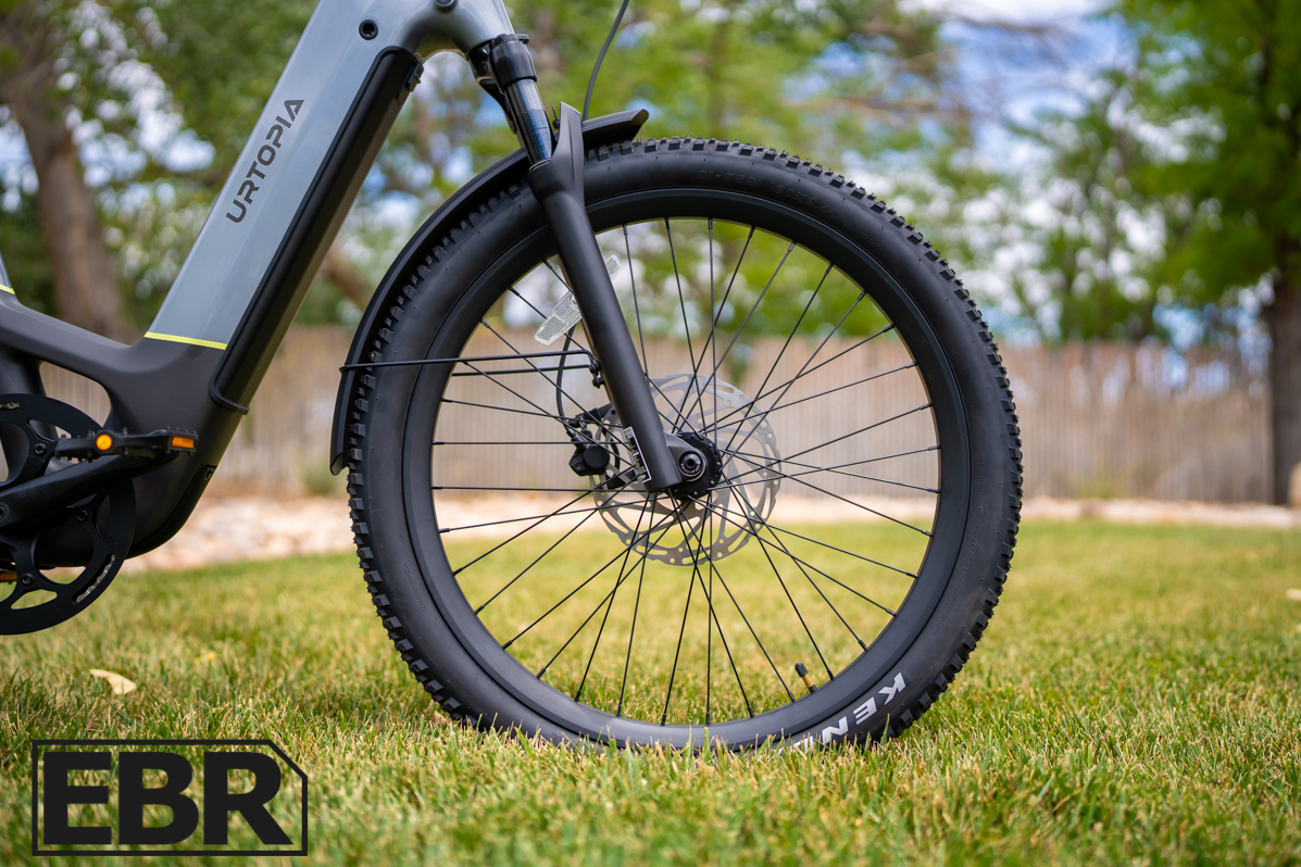 Urtopia Carbon Atom front wheel close-up showcasing lightweight carbon fiber construction