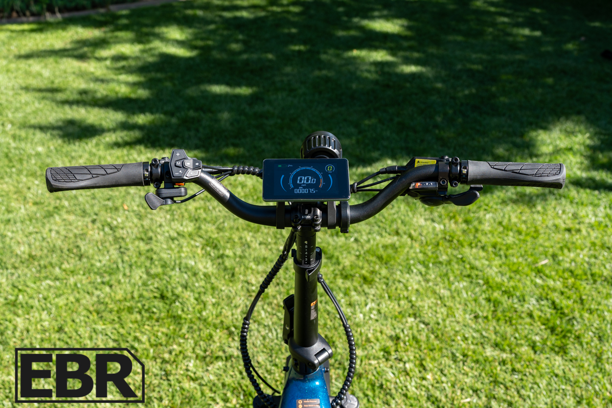Hynox Trooper X cockpit controls including handlebar display throttle and brake levers