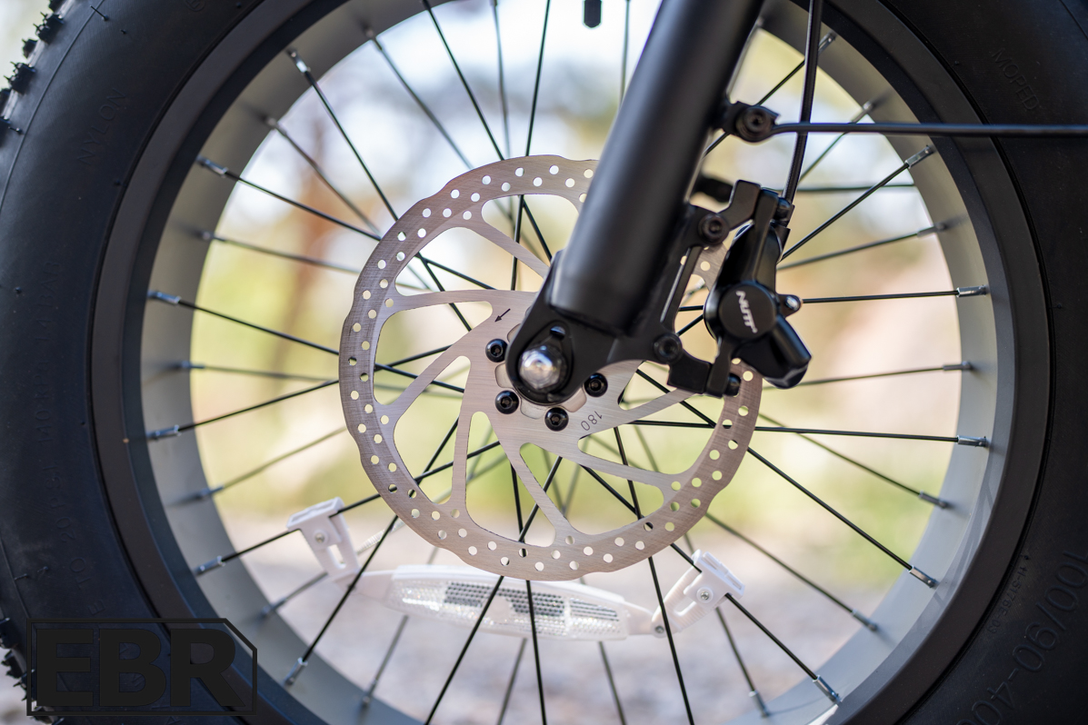 GoTrax F3 front brake lever and Calibur fork detail closeup