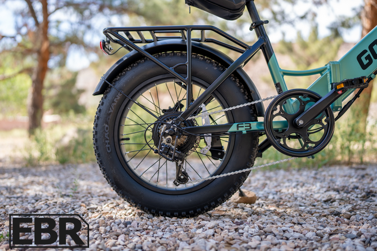 GoTrax F3 rear wheel close-up showing hub motor and tire detail